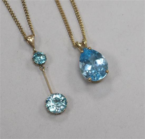 A 9ct gold and blue topaz pendant, on 9ct gold chain and a yellow metal and blue zircon drop pendant on chain.